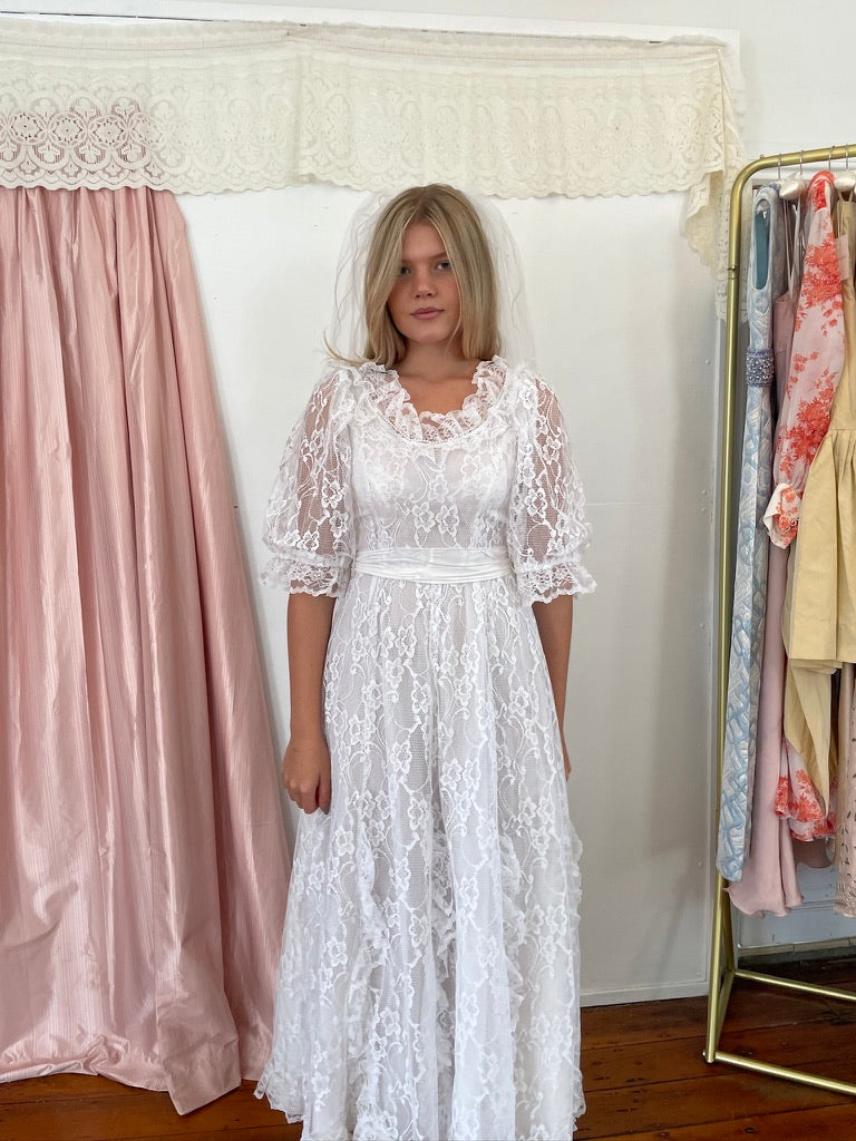 Vintage 80s lace puff sleeve wedding dress with bow
